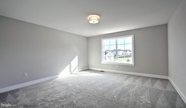 2030 N Fall Harvest Dr, Mechanicsburg, PA 17055 - spare room with carpet flooring and baseboards