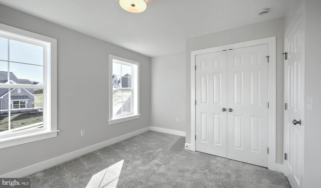 2030 N Fall Harvest Dr, Mechanicsburg, PA 17055 - unfurnished bedroom with carpet flooring, a closet, and baseboards