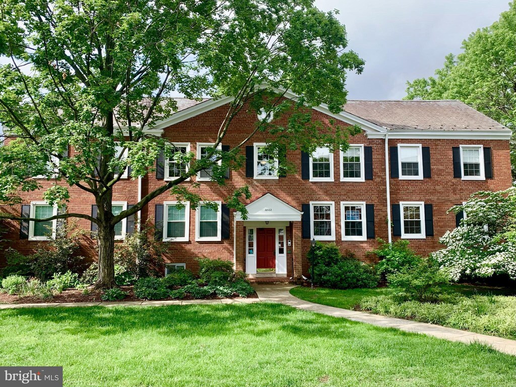 2862 S Buchanan St S Unit B2, Arlington, VA 22206 - view of property with brick siding and a front yard