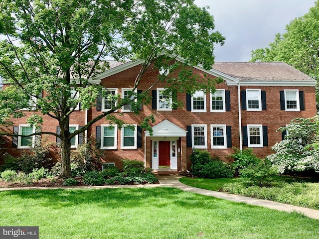 2862 S Buchanan St S Unit B2, Arlington, VA 22206 - view of property with brick siding and a front yard
