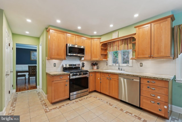 11 Moro Dr, Hamilton, NJ 08619 - kitchen with appliances with stainless steel finishes, open shelves, a sink, decorative backsplash, and recessed lighting
