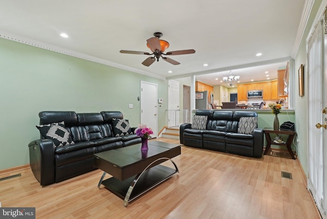 11 Moro Dr, Hamilton, NJ 08619 - living area featuring light wood-type flooring, crown molding, recessed lighting, ceiling fan, and a chandelier