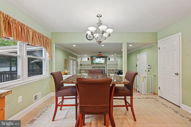 11 Moro Dr, Hamilton, NJ 08619 - dining space featuring light tile patterned flooring, a ceiling fan, a chandelier, baseboards, and a fireplace