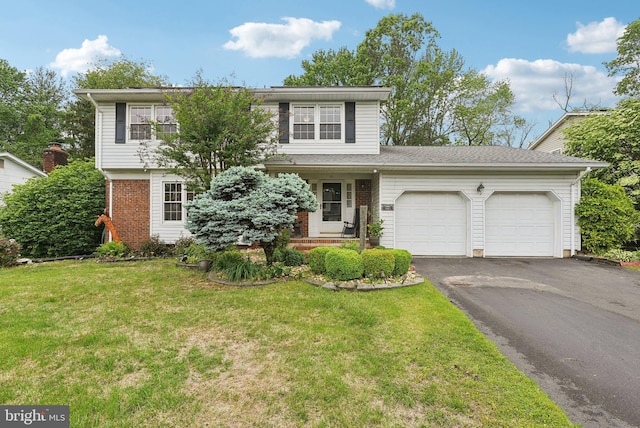 11 Moro Dr, Hamilton, NJ 08619 - view of front of home featuring a garage, driveway, a front yard, and brick siding