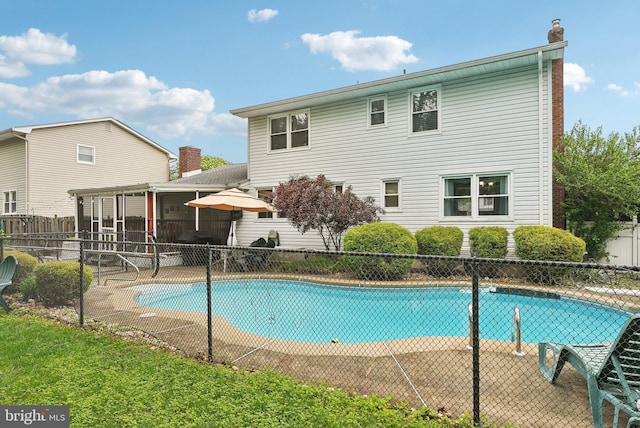 11 Moro Dr, Hamilton, NJ 08619 - view of swimming pool with a sunroom