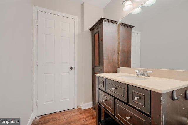 4410 Sophias Way, Belcamp, MD 21017 - bathroom with wood finished floors, vanity, and baseboards