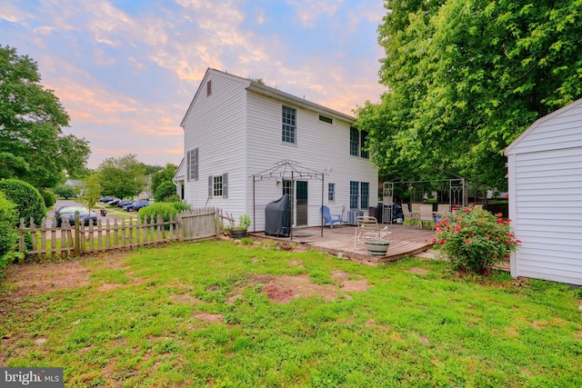 4410 Sophias Way, Belcamp, MD 21017 - back of house at dusk featuring a deck