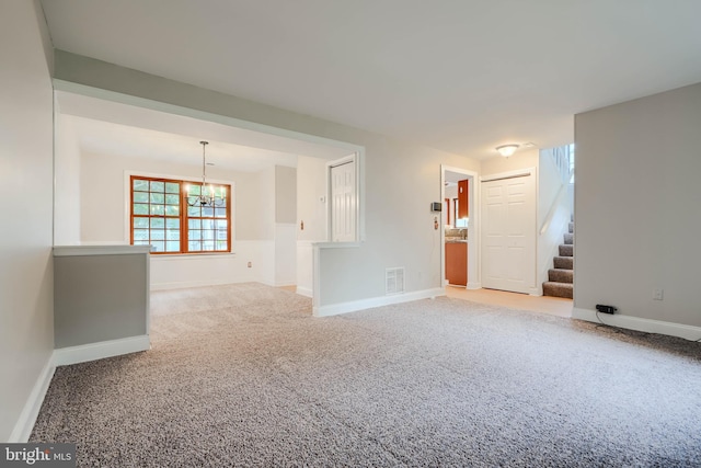 4410 Sophias Way, Belcamp, MD 21017 - unfurnished living room with a chandelier, stairs, baseboards, and carpet flooring