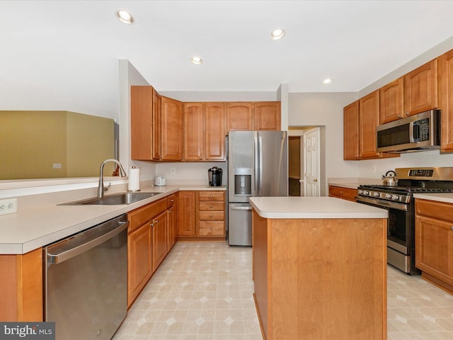 12318 Cherry Branch Dr, Clarksburg, MD 20871 - kitchen with appliances with stainless steel finishes, a sink, light floors, a kitchen island, and light countertops