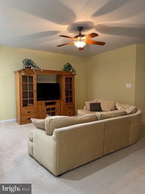 12318 Cherry Branch Dr, Clarksburg, MD 20871 - carpeted living area with ceiling fan and baseboards