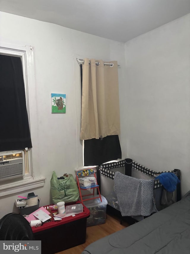 3910 N 8th St, Philadelphia, PA 19140 - bedroom featuring wood finished floors and cooling unit
