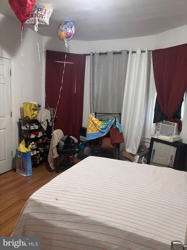 3910 N 8th St, Philadelphia, PA 19140 - bedroom with wood finished floors and cooling unit