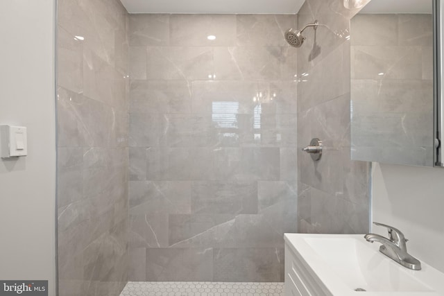 2456 20th St NW Unit 507, Washington, DC 20009 - bathroom featuring a tile shower and vanity