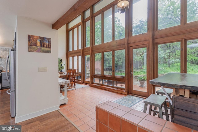 7430 Joes Creek Rd, Linville, VA 22834 - entryway with a towering ceiling, baseboards, beam ceiling, and light tile patterned flooring
