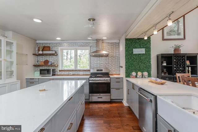 7430 Joes Creek Rd, Linville, VA 22834 - kitchen featuring stainless steel appliances, wall chimney range hood, gray cabinetry, tasteful backsplash, and recessed lighting
