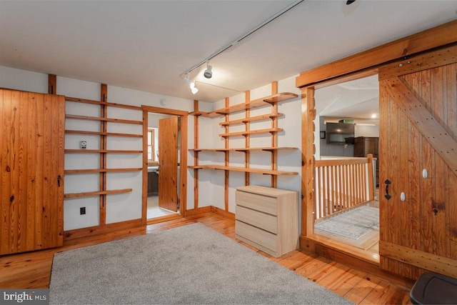 7430 Joes Creek Rd, Linville, VA 22834 - below grade area featuring wood finished floors and rail lighting