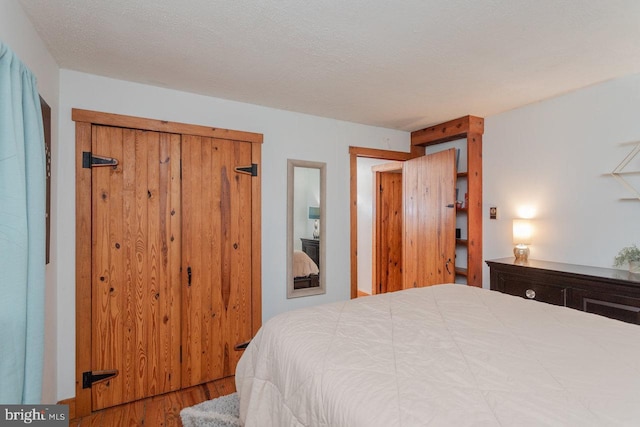 7430 Joes Creek Rd, Linville, VA 22834 - bedroom with wood finished floors and a closet
