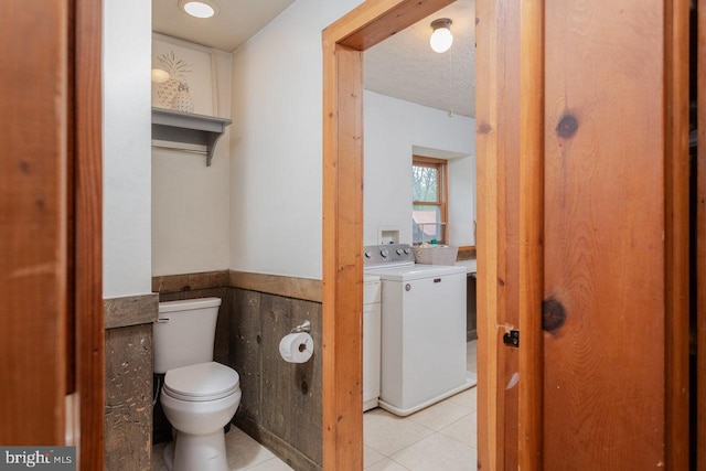 7430 Joes Creek Rd, Linville, VA 22834 - bathroom with independent washer and dryer, toilet, wainscoting, tile patterned flooring, and vanity