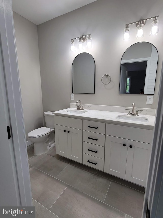 5209 10th Pl S, Arlington, VA 22204 - full bath with tile patterned flooring, toilet, and double vanity
