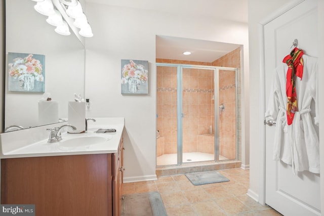 444 Exchange Ave Unit 444, Gaithersburg, MD 20878 - bathroom featuring double vanity, a stall shower, baseboards, and tile patterned floors