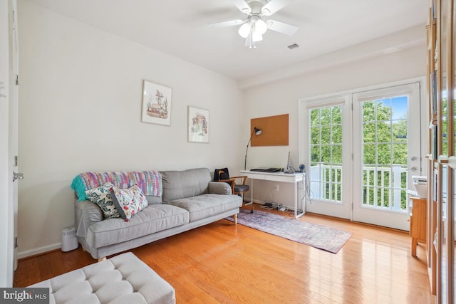 444 Exchange Ave Unit 444, Gaithersburg, MD 20878 - living room featuring a ceiling fan and wood finished floors