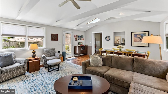 living room featuring wood finished floors and ceiling fan