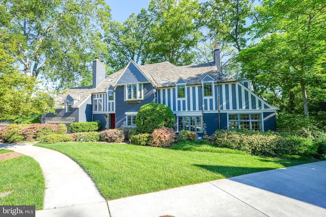 4301 Forest Ln NW, Washington, DC 20007 - english style home featuring a chimney and a front yard