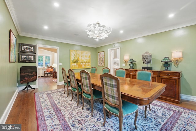 4301 Forest Ln NW, Washington, DC 20007 - dining room with wood finished floors, baseboards, a chandelier, ornamental molding, and recessed lighting