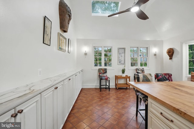 4301 Forest Ln NW, Washington, DC 20007 - dining area with a ceiling fan and dark tile patterned flooring