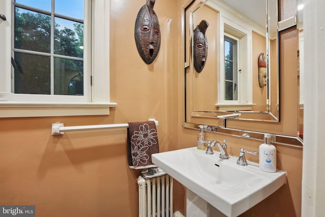 4301 Forest Ln NW, Washington, DC 20007 - bathroom featuring radiator and a sink