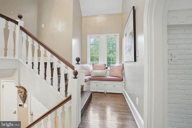 4301 Forest Ln NW, Washington, DC 20007 - staircase featuring wood finished floors and arched walkways