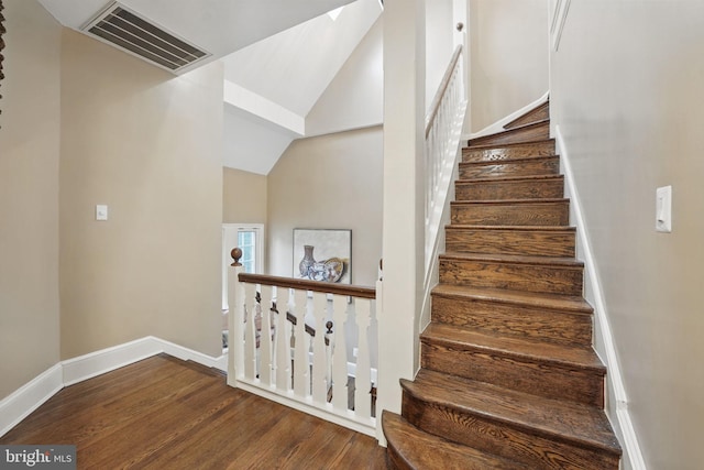 4301 Forest Ln NW, Washington, DC 20007 - stairs with wood finished floors, lofted ceiling, and baseboards
