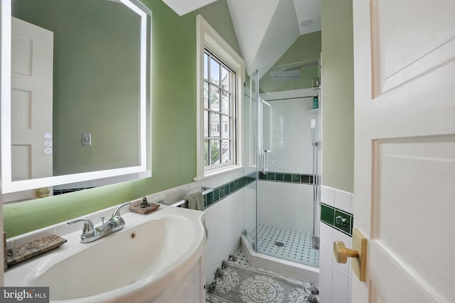 4301 Forest Ln NW, Washington, DC 20007 - full bath featuring a sink, a stall shower, tile walls, and vaulted ceiling