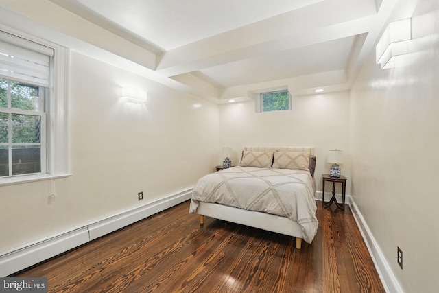 4301 Forest Ln NW, Washington, DC 20007 - bedroom with baseboard heating, hardwood / wood-style floors, and baseboards