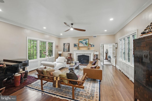 4301 Forest Ln NW, Washington, DC 20007 - living area with ceiling fan, wood finished floors, a fireplace, crown molding, and recessed lighting