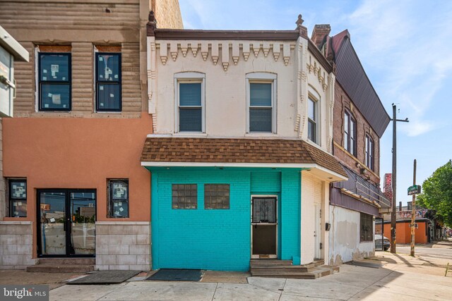 865 Belmont Ave, Philadelphia, PA 19104 - view of front of property with entry steps, a shingled roof, and brick siding