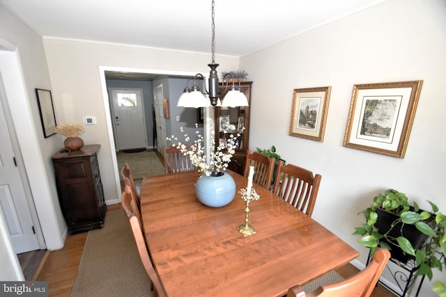10 Casimir Ct, New Castle, DE 19720 - dining room featuring a chandelier, crown molding, light wood finished floors, and baseboards