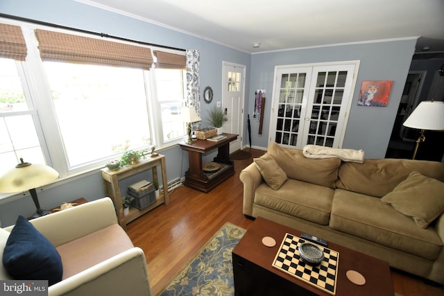 10 Casimir Ct, New Castle, DE 19720 - living area featuring wood finished floors, ornamental molding, french doors, and baseboards