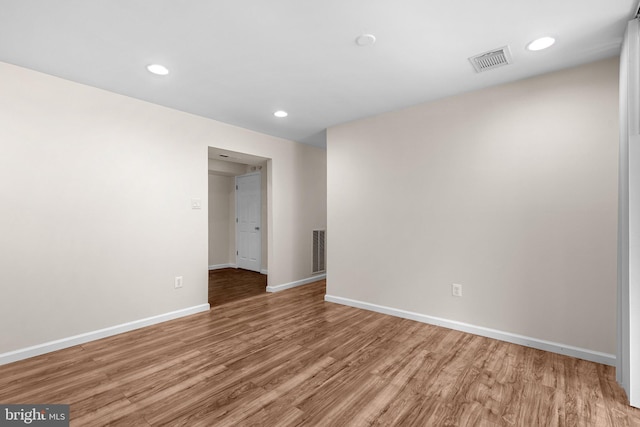 10234 Prince Pl Unit 17-T2, Upper Marlboro, MD 20774 - spare room featuring wood finished floors, baseboards, and recessed lighting