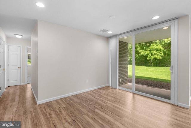 10234 Prince Pl Unit 17-T2, Upper Marlboro, MD 20774 - spare room with wood finished floors, recessed lighting, and baseboards