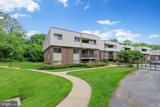 10234 Prince Pl Unit 17-T2, Upper Marlboro, MD 20774 - view of building exterior with a residential view