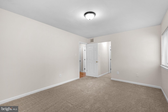 10234 Prince Pl Unit 17-T2, Upper Marlboro, MD 20774 - empty room with carpet floors and baseboards