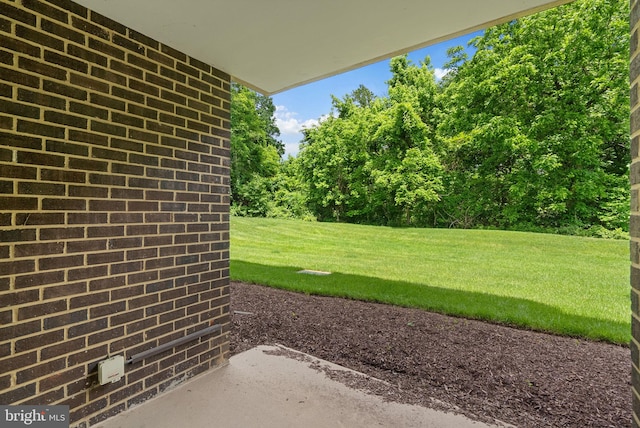 10234 Prince Pl Unit 17-T2, Upper Marlboro, MD 20774 - view of grassy yard with a patio