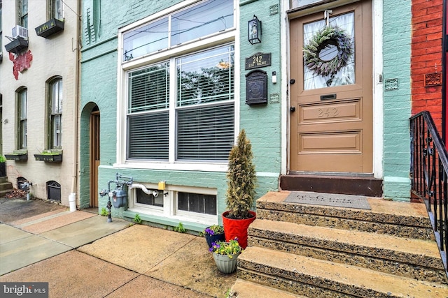 242 E Walnut St, Lancaster, PA 17602 - property entrance featuring brick siding