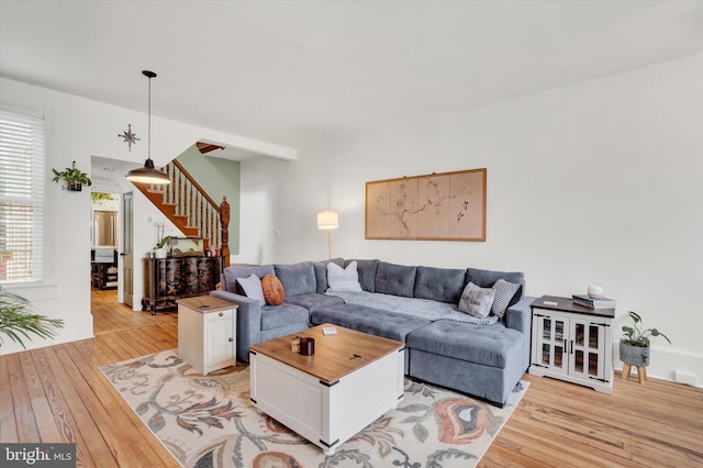 242 E Walnut St, Lancaster, PA 17602 - living area featuring stairs and light wood-style floors