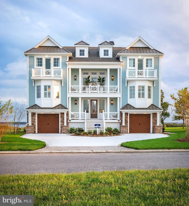 22253 Waterview Rd Lot 4, Lewes, DE 19958 - view of front facade featuring a standing seam roof, a garage, and a balcony