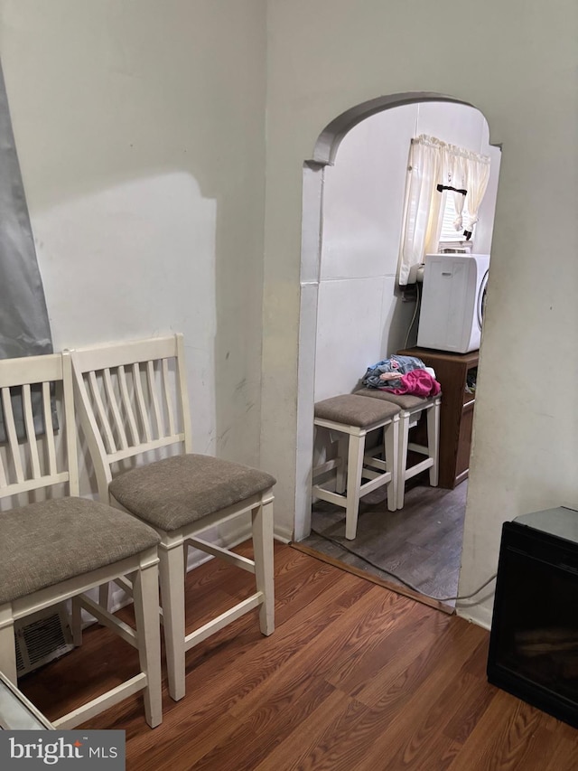 3857 N Marshall St, Philadelphia, PA 19140 - corridor featuring arched walkways and wood finished floors