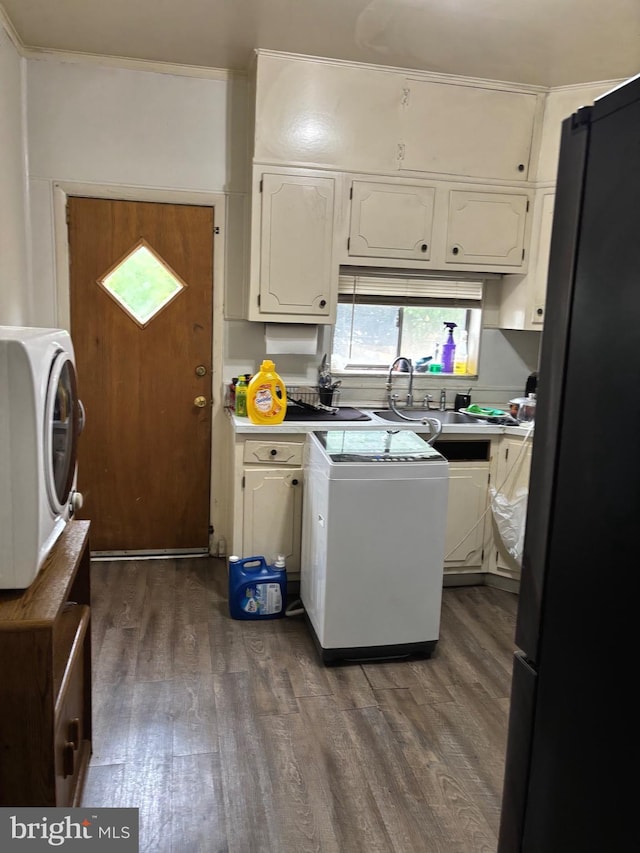 3857 N Marshall St, Philadelphia, PA 19140 - kitchen featuring freestanding refrigerator, dark wood-style floors, white cabinetry, light countertops, and washer / clothes dryer