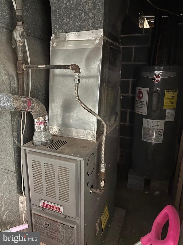 3857 N Marshall St, Philadelphia, PA 19140 - utility room featuring water heater