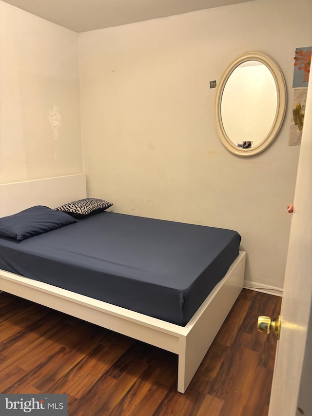 3857 N Marshall St, Philadelphia, PA 19140 - bedroom with wood finished floors and baseboards